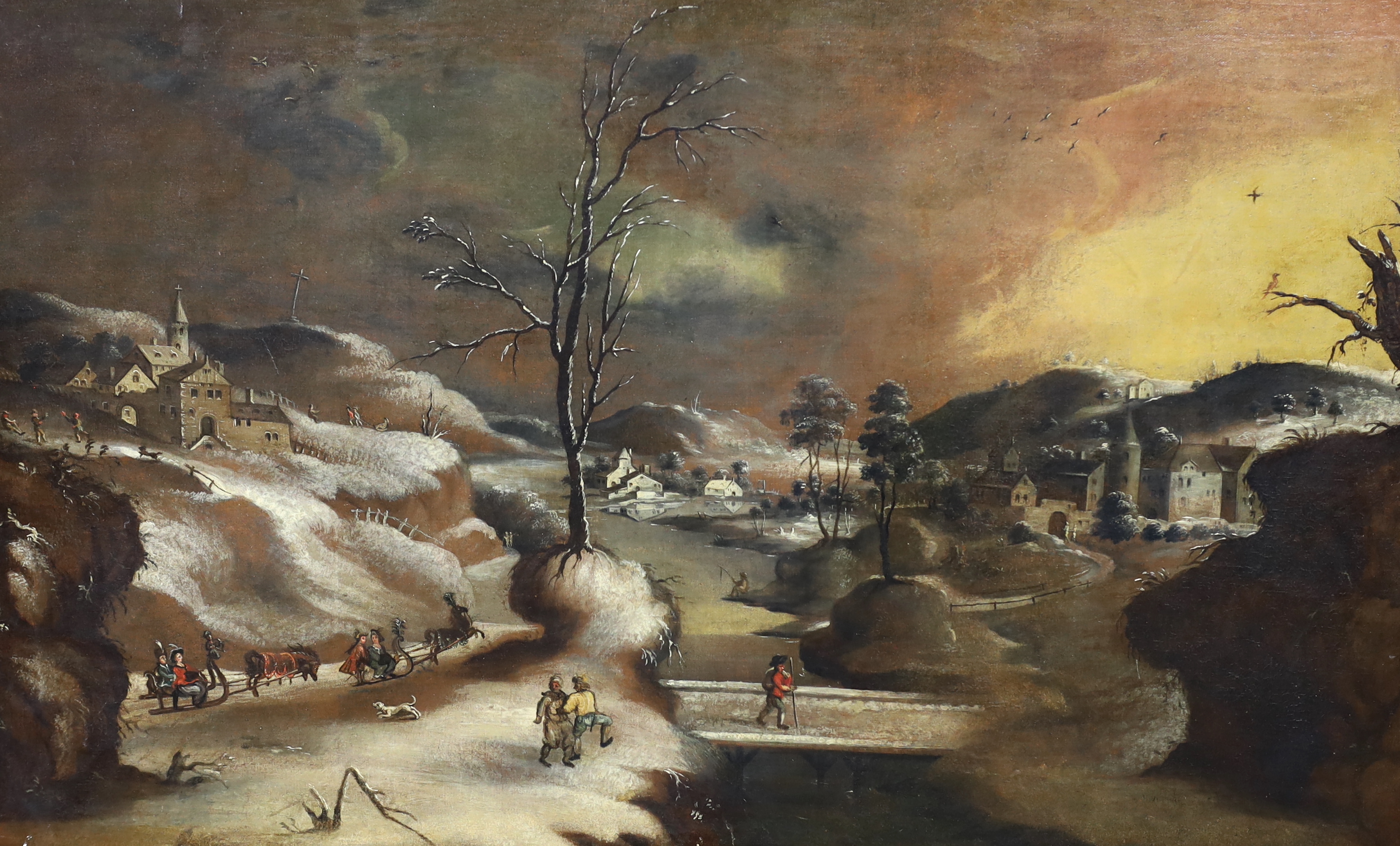 17th century Flemish School, oil on canvas, Figures in a winter landscape, 69 x 112cm, unframed